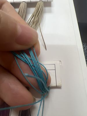 0.3 mm de hilo revestido con cera de poliéster hilo de cera plana de alta tenacidad hilo de costura de poliéster de cera